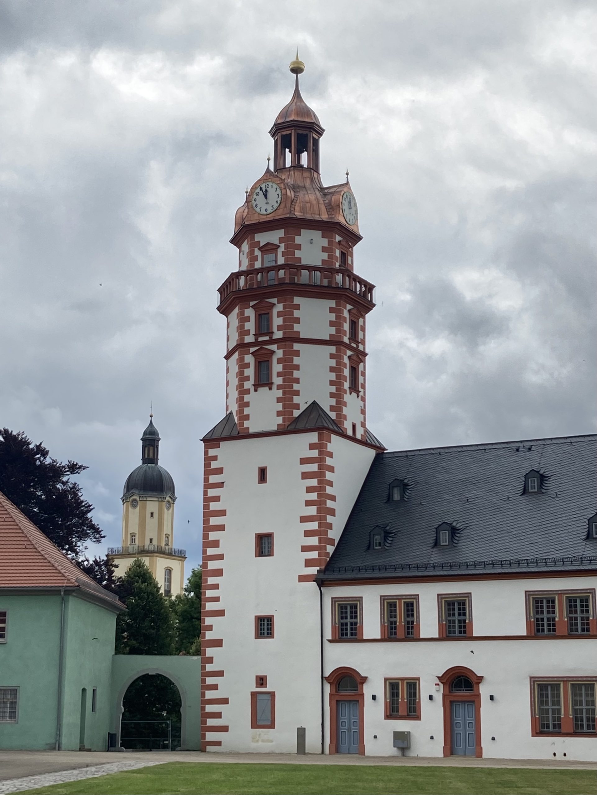 Picture of the castle tower in the foreground with the tower of St Michaelis in the background